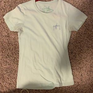 Light green guy Harvey shirt size small